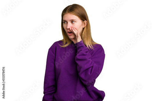 Young caucasian woman isolated being shocked because of something she has seen.