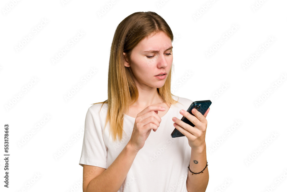 Young caucasian woman using a mobile phone cutout isolated Young caucasian woman using a mobile phone cutout isolated