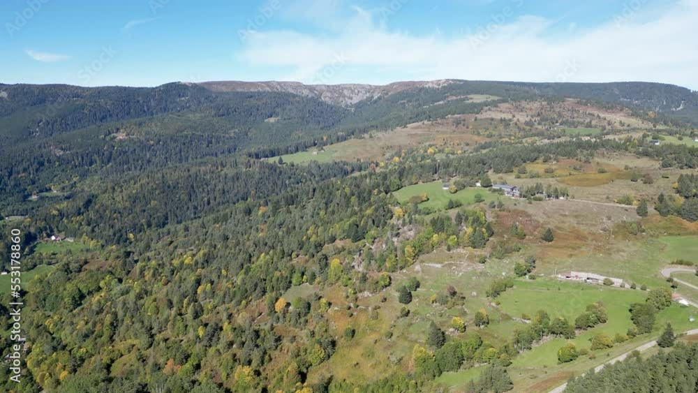 Aerial drone flight over the Col de Wettstein and the Musmiss farm-inn from Glasborn/Linge towards Tanet-Gazon du Faing in Alsace, by sunny summer weather, view on Vosges forest and mountains Aerial drone flight over the Col de Wettstein and the Musmiss farm-inn from Glasborn/Linge towards Tanet-Gazon du Faing in Alsace, by sunny summer weather, view on Vosges forest and mountains