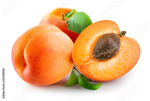 Apricot isolated. Three apricots on white background. Whole and a half of apric with clipping path. Full depth of field.