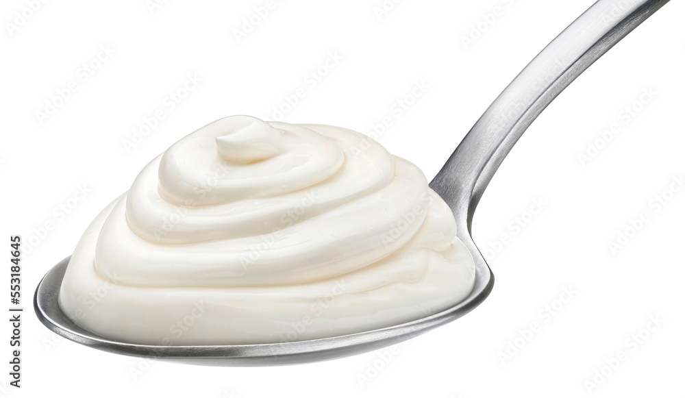 Whipped mascarpone cream in spoon isolated on white background Whipped mascarpone cream in spoon isolated on white background
