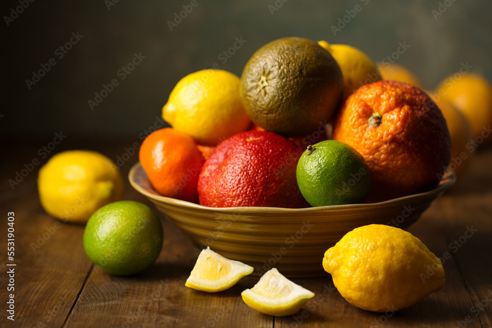 Juicy exotic citrus fruits in a large bowl