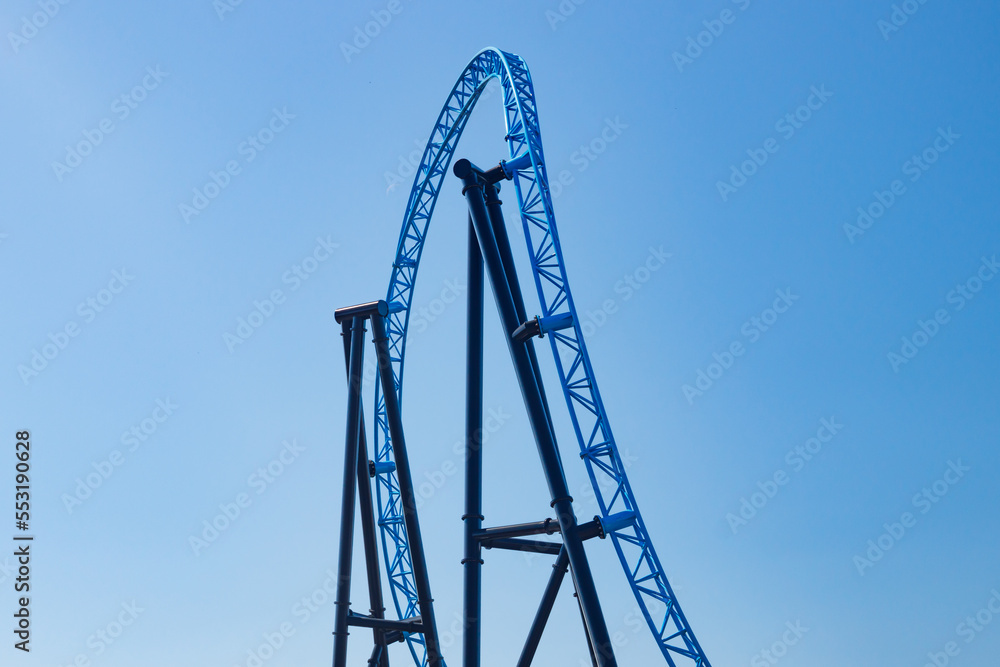 Empty ride roller coaster on sky background in amusement park