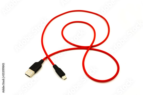 Red USB cable for smartphone isolated on white background. 