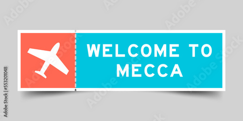 Orange and blue color ticket with plane icon and word welcome to mecca on gray background