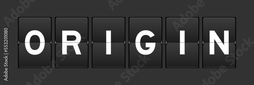 Black color analog flip board with word origin on gray background