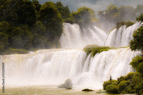 Ban Gioc Waterfall or Detian Falls, Vietnam's best-known waterfall located in Cao bang Border with China, shot in August with a lot of water