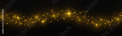 Golden luminous dust with colorful lights bokeh. Christmas trail concept. Abstract glowing lights isolated on transparent background. Magic concept.