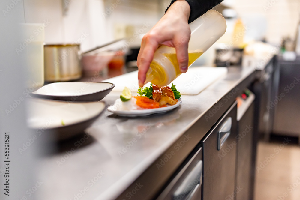 chef cooking slice salmon fish and shrimp with salad on kitchen chef cooking slice salmon fish and shrimp with salad on kitchen