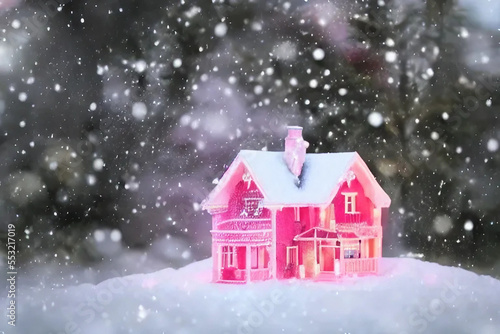 Small pink Christmas house in snow