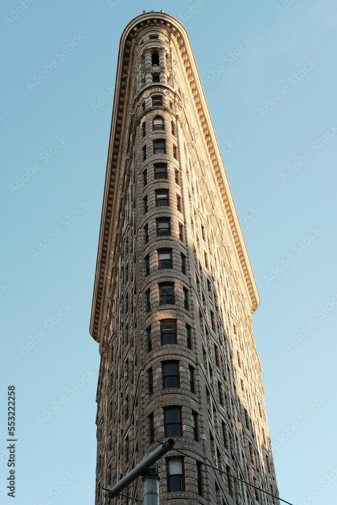 NEW YORK, USA - March 19, 2018 : Flat Iron building facade on March 19, 2018. Completed in 1902, it is considered to be one of the first skyscrapers ever built
