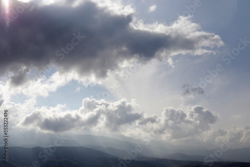 Beautiful morning sky and clouds view with silhouettes of mountains on background. Beautiful natural landscape. Kok tobe hills in Almaty Kazakhstan