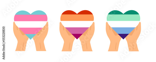 Gay, lisbian, transgender flag heart in hands, LGBT Pride Month photo