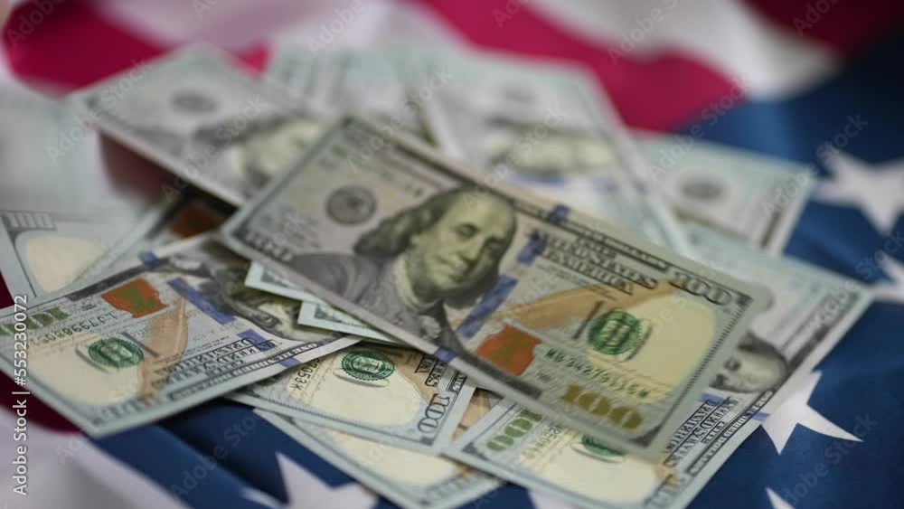 dollar money and American flag. bankrupt man counting money cash. business crisis finance dollar concept usd. close-up of a hand counting paper dollars. exchange finance economy dollar pay tax dollar money and American flag. bankrupt man counting money cash. business crisis finance dollar concept usd. close-up of a hand counting paper dollars. exchange finance economy dollar pay tax