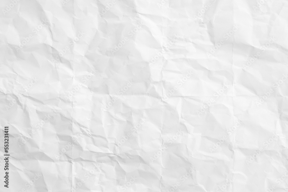 White crumpled and creased paper texture background White crumpled and creased paper texture background