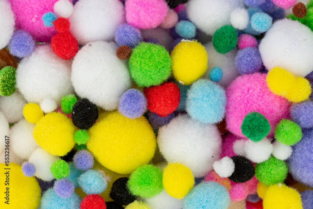 the small colorful pom pom balls (pompoms) the small colorful pom pom balls (pompoms)