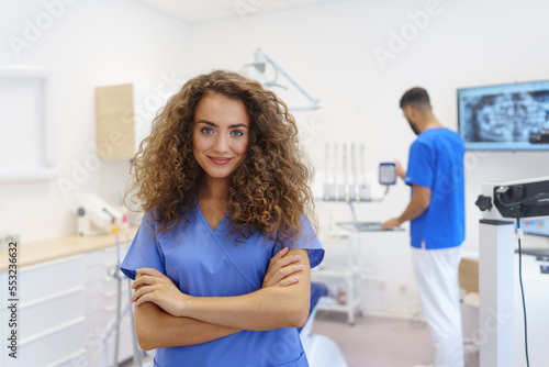 Portrait of young woman dentist at private dental clinic.
