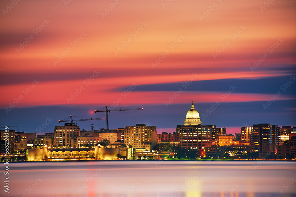 Long Exposure of the Madison skyline reflected in the waters of Lake Monona. Madison, 
