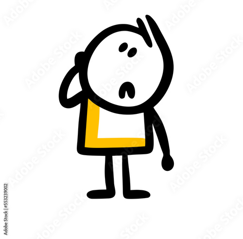 Funny little boy looks up anxiously with his hand to his face.