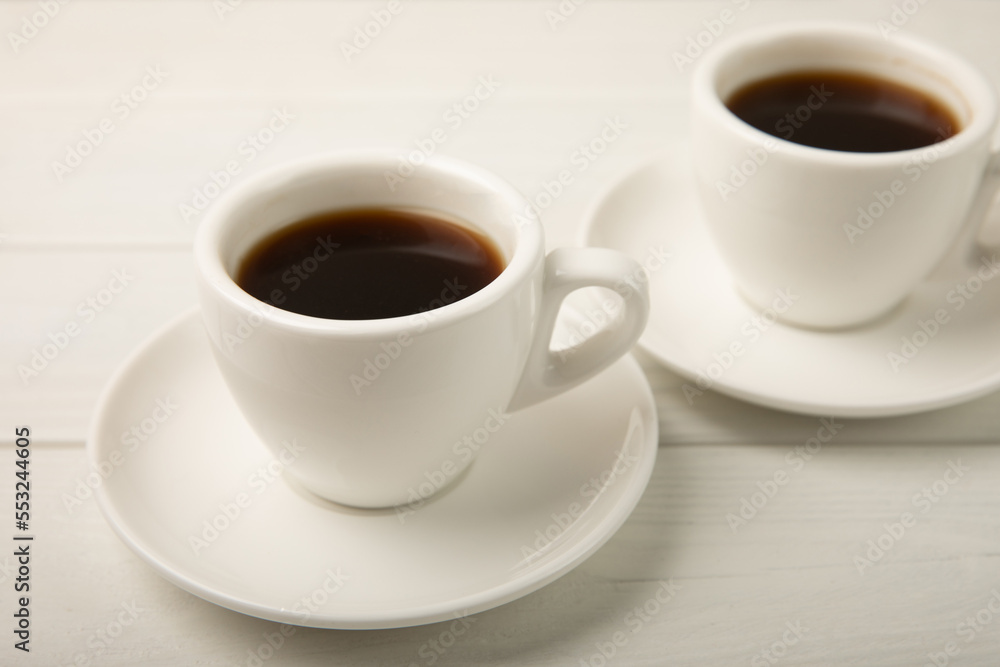 Cup of coffee on white texture wood. Espresso. View from above. Space for copy. MOCAP. Breakfast. good morning. Cup of coffee on white texture wood. Espresso. View from above. Space for copy. MOCAP. Breakfast. good morning.