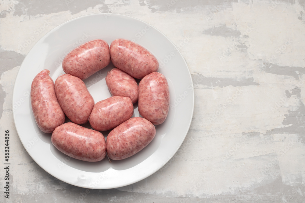 rolled botifarra, a pork meat sausage typical of Catalonia, Spain, in a plastic rolled botifarra, a pork meat sausage typical of Catalonia, Spain, in a plastic