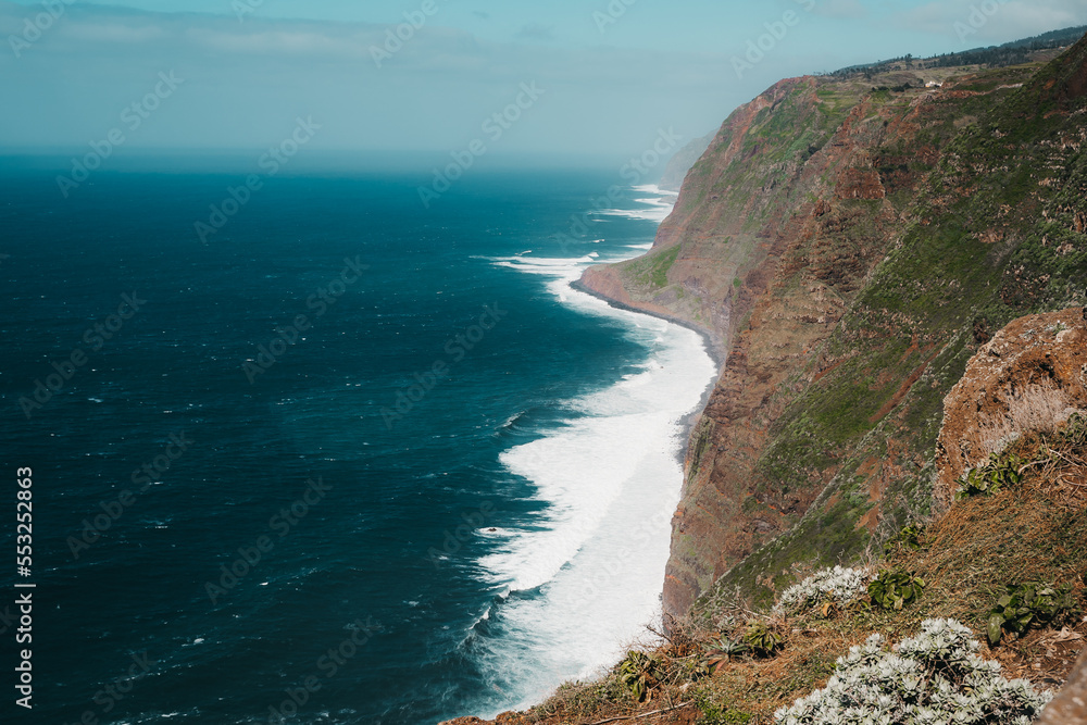 Dramatic cliff faces at the edge of the sea on the island of Madeira