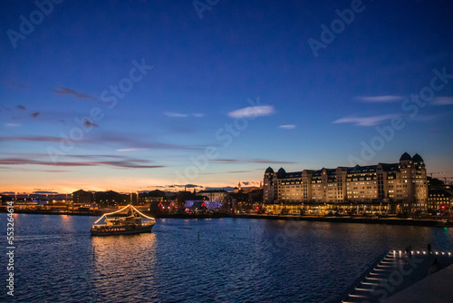 City of Oslo Norway in the Evening with Sunset  Sea  Historical buildings and Christmas decorations