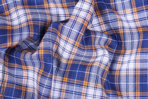blue, orange & white plaid/checkered fabric background