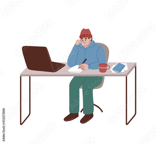 Man freezing at work in the unheated office. Feeling cold in the room. Energy crisis. Economy of gas. Character wearing informal warm clothes trembling with cold at work place.