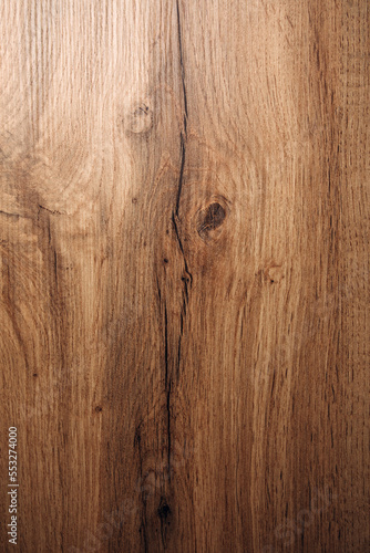 Wooden brown background with knots. Backdrop for design