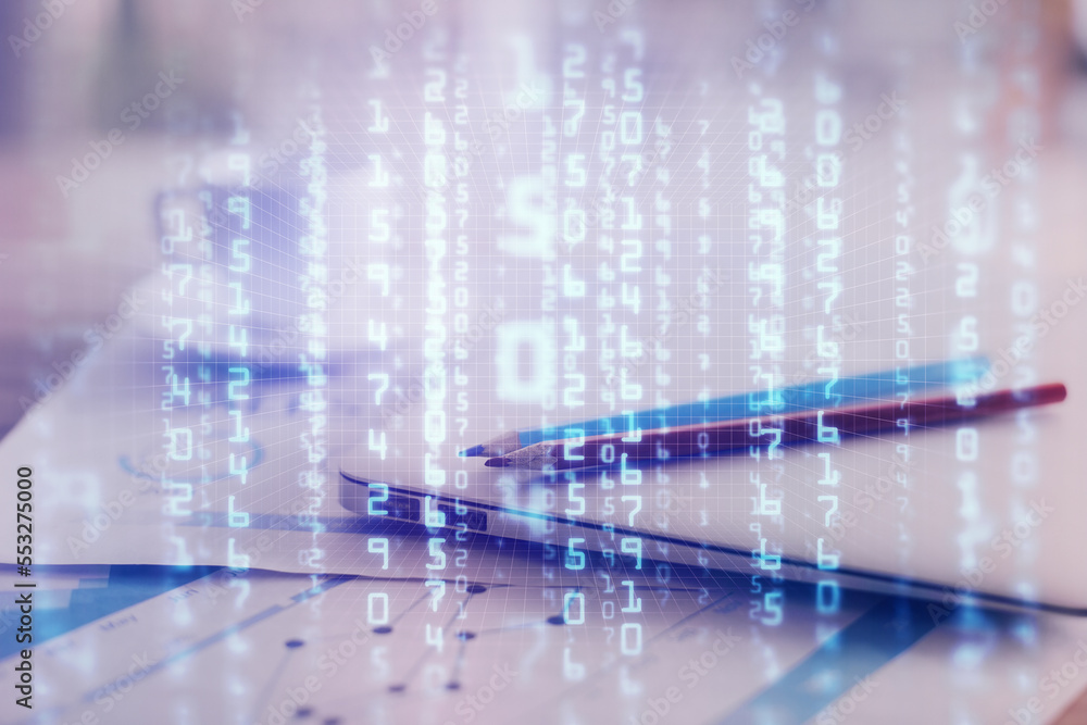 Fototapeta premium Double exposure of table with computer on background and data theme hologram. Data technology concept.