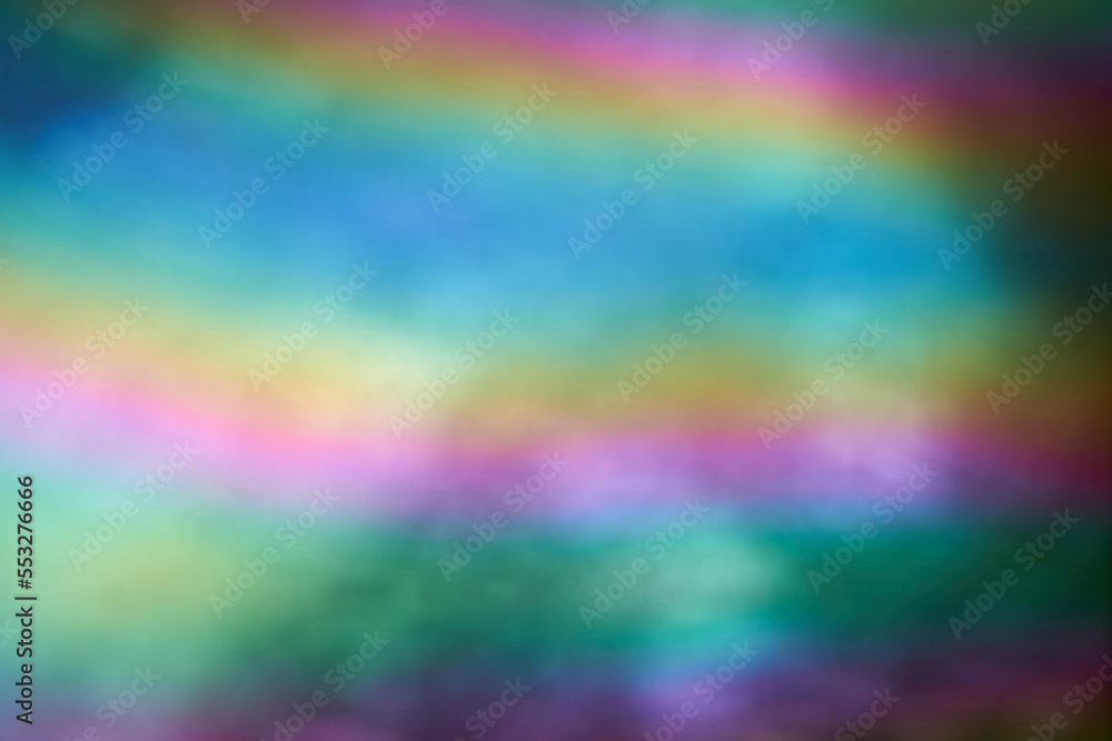 Blurry holographic rainbow color. Abstract bright holographic texture design for drawing and background. Minimalist style. High quality photo