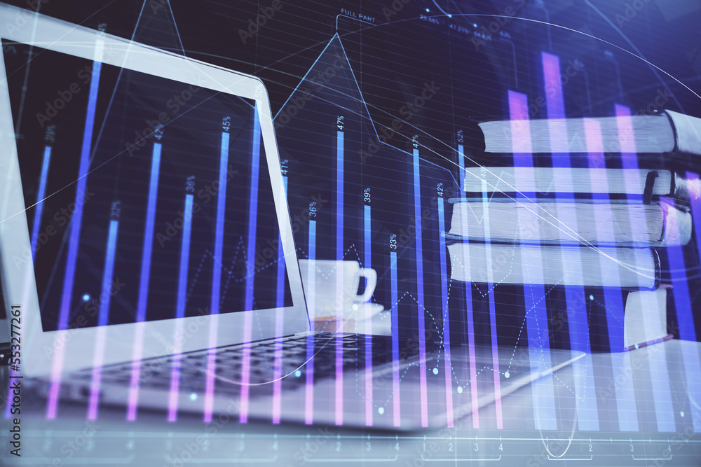 Forex Chart hologram on table with computer background. Multi exposure. Concept of financial markets. Forex Chart hologram on table with computer background. Multi exposure. Concept of financial markets.
