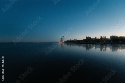 Bild auf Leinwand Torre Vasco da Gama Tower After Sunset, Blue Hour, River, Ocean, Clear Sky, Lisb