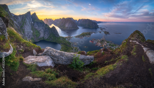 sunset from the top of the mountain at reinebringen, lofoten islands photo