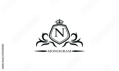 Luxury logo template with calligraphic elegant initial N. Emblem logo for restaurants, hotels, bars and boutiques. photo