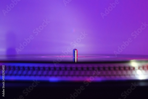 DJ Turntable with vinyl with music background