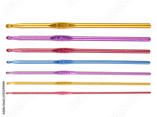 Colored hooks for wool knitting on white background