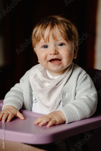 baby portrait at the table, happy baby.