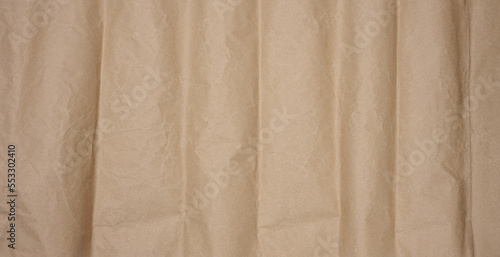 Texture of brown crumpled craft paper, full frame © nndanko