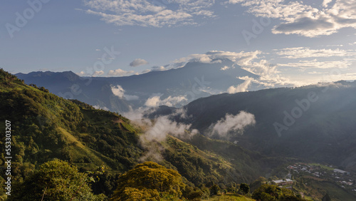 mountains and green hills with clouds in ecuador