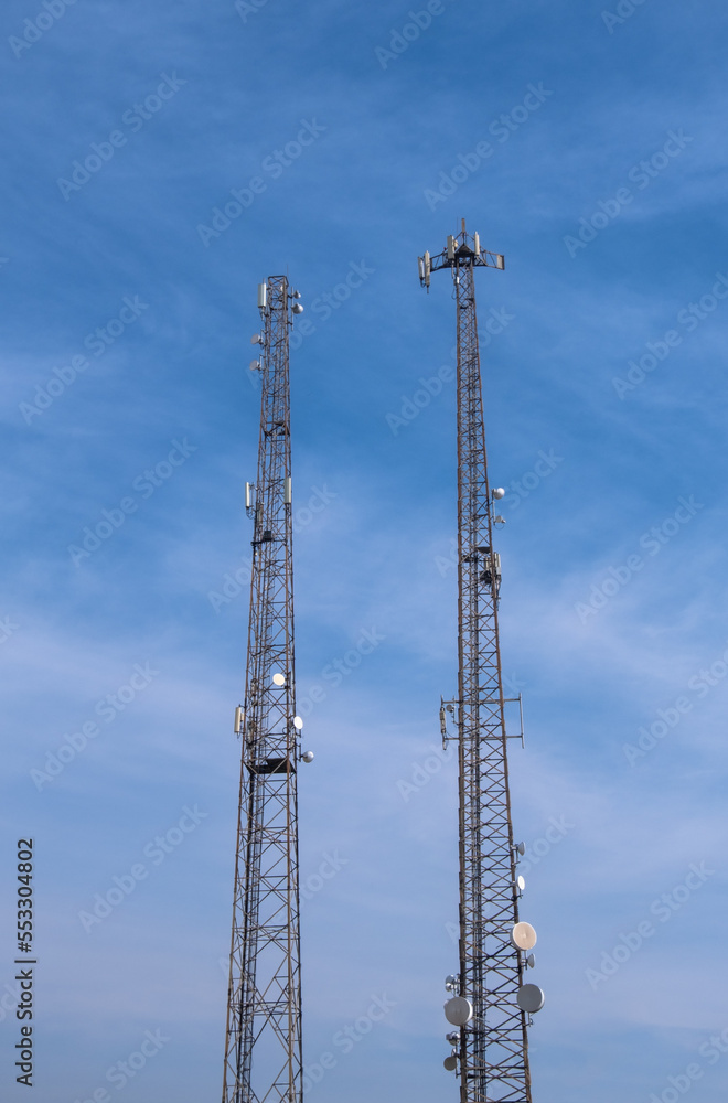 Base stations and antennas on metal telecommunications tower. Base stations and antennas on metal telecommunications tower.