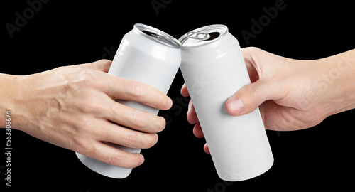 Two hands clinking white aluminium beer cans, isolated on black background