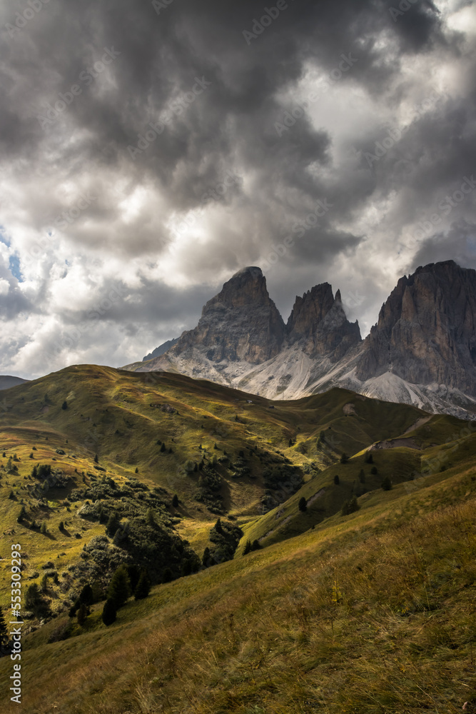 Clouds over mountain Sella Pass in Dolomites