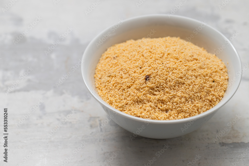 Farofa, typical brazilian manioc flour side dish on ceramic Farofa, typical brazilian manioc flour side dish on ceramic