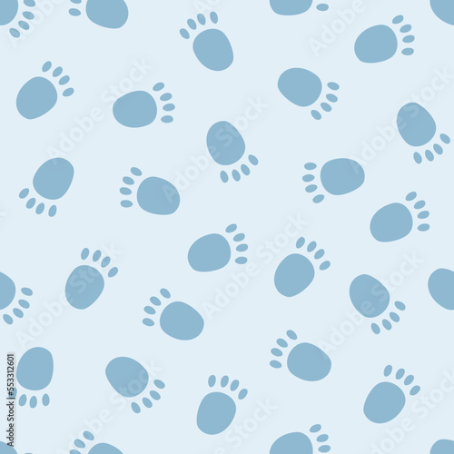 Vector seamless pattern with cute polar bear paw prints on snow