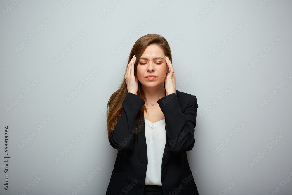 Business woman with headache, head pain, touching head, isolated portrait. Business woman with headache, head pain, touching head, isolated portrait.