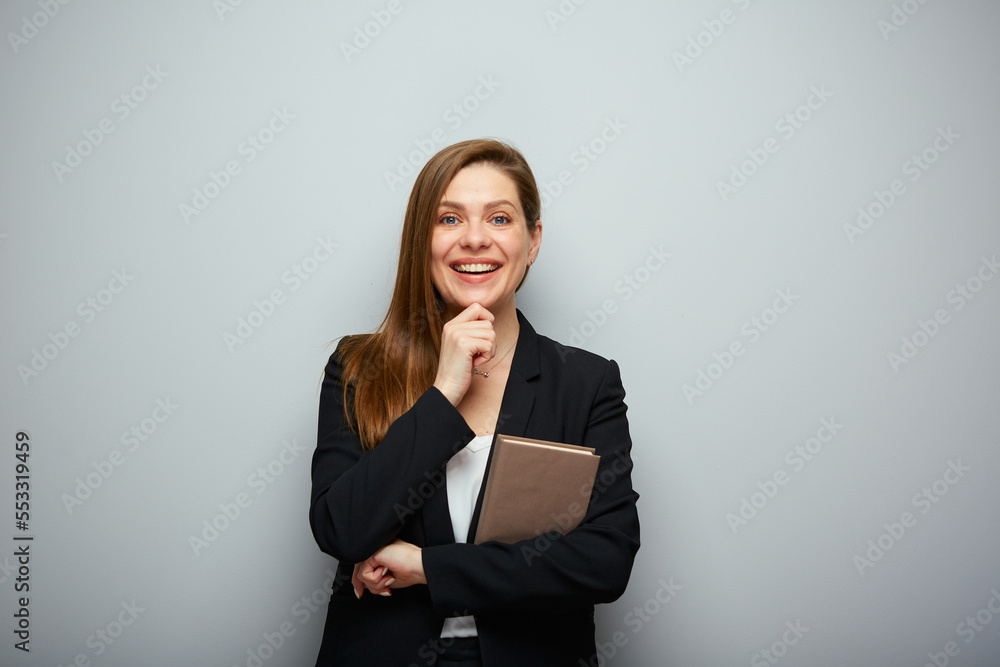 Smart woman holding book. Isolated portrait with copy space. Smart woman holding book. Isolated portrait with copy space.