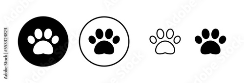 Paw icon vector illustration. paw print sign and symbol. dog or cat paw