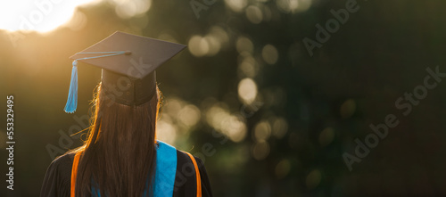 Graduates wear a black dress, black hat at the university level.